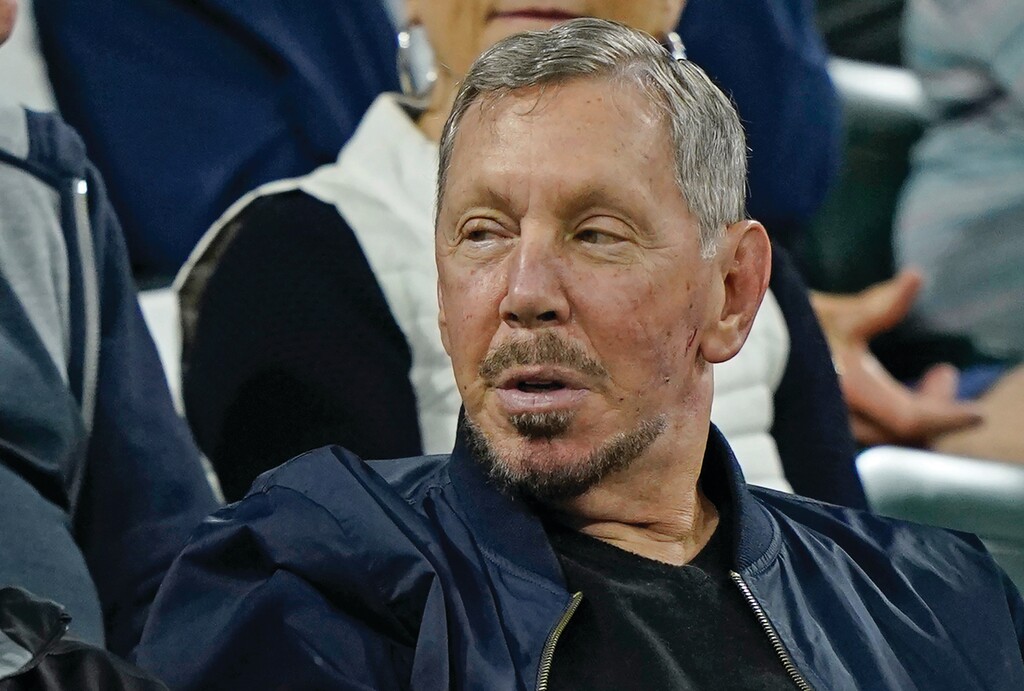 FILE - Larry Ellison, chairman of Oracle Corporation and chief technology officer, watches from the stands at the BNP Paribas Open tennis tournament Oct. 13, 2021, in Indian Wells, Calif. (AP Photo/Mark J. Terrill, File)