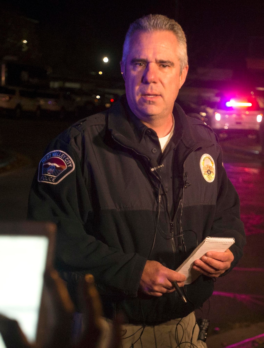 (Rick Egan  |  The Salt Lake Tribune)  Matt Elson, West Valley Police, talks to the media about the West Valley Police officer that was shot at the Village at Rivers Edge apartment complex in West Valley, City, Tuesday, November 7, 2017.
