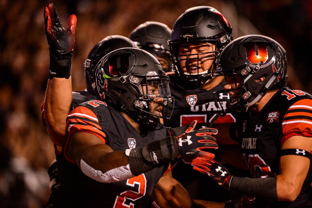 (Trent Nelson | The Salt Lake Tribune)  Utah Utes running back Zack Moss (2) celebrates a touchdown as the University of Utah hosts Washington at Rice-Eccles Stadium in Salt Lake City, Saturday Sept. 15, 2018.