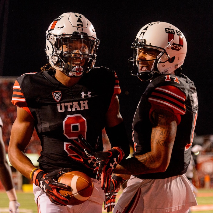 (Trent Nelson | The Salt Lake Tribune) Utah Utes wide receiver Darren Carrington II (9) celebrates a touchdown with teammate Utah Utes wide receiver Raelon Singleton (11) as the Utah Utes host the San Jose State Spartans, NCAA football at Rice-Eccles Stadium in Salt Lake City, Saturday September 16, 2017.
