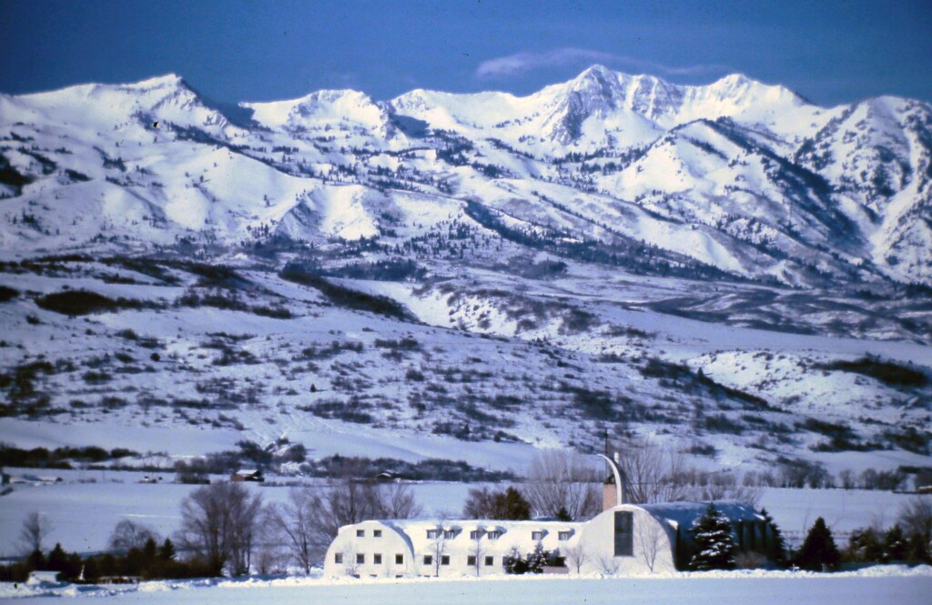 (Monastery archives)
The Holy Trinity Abbey and Mount Ogden after a winter snowstorm, circa 1970s. The monastery closed in 2017.