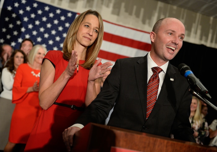 (Francisco Kjolseth  |  The Salt Lake Tribune)  Lt. Governor Spencer Cox is joined by his wife Abby as they introduce John Curtis for congress during celebrations at the Provo Marriott Hotel & Conference Center Tuesday, Nov. 7, 2017. 