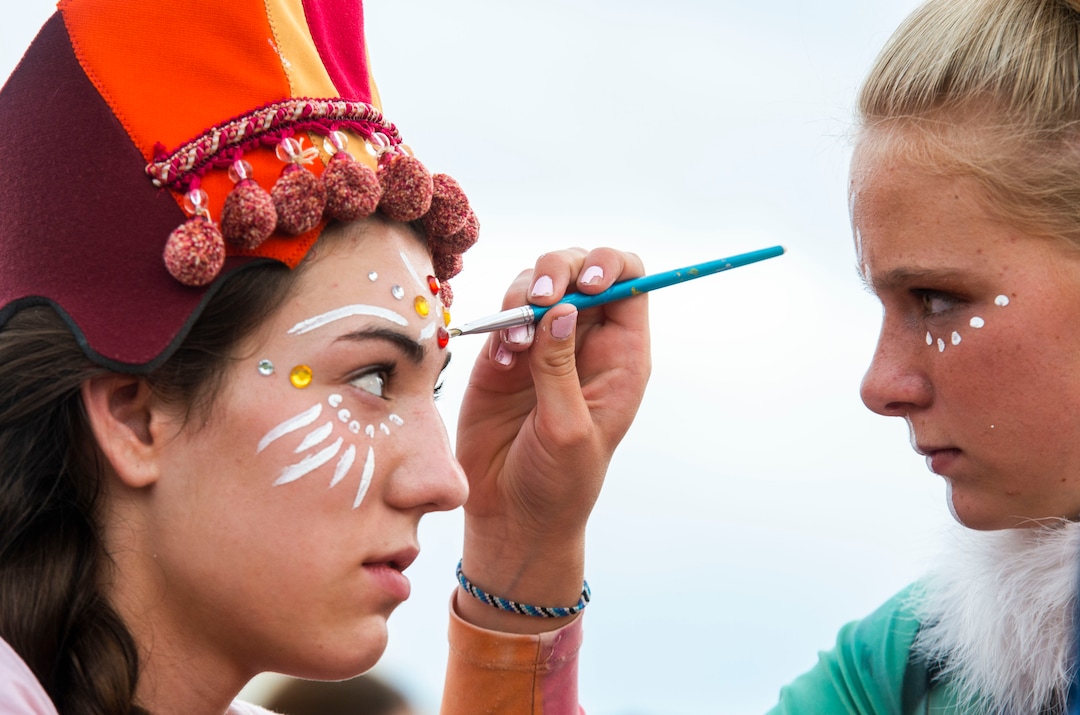 (Rick Egan  |  The Salt Lake Tribune)    Nephite Dancer, Azlyn Ristine,15, (left) has her face painted by 15-year-old, Bethany Christensen, 15, a Lamanite dancer before the Mormon Miracle Pageant Wednesday, June 12, 2019.  The final run for the pageant continues through Saturday, June 22.