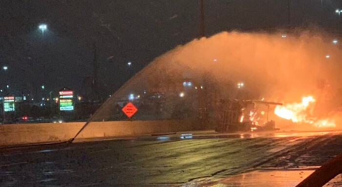 (Photo courtesy Salt Lake City Fire Department) A diesel tanker burst into flames after an accident early Friday morning, shutting down southbound I-15.