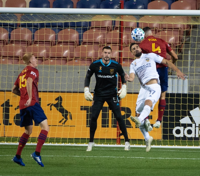 (Francisco Kjolseth  |  The Salt Lake Tribune) Los Angeles Galaxy midfielder Sebastian Lletget (17) tries a header past Real Salt Lake defender Donny Toia (4) as Real Salt Lake hosts L.A. Galaxy at Rio Tinto Stadium in Sandy on Wednesday, Sept. 23, 2020.