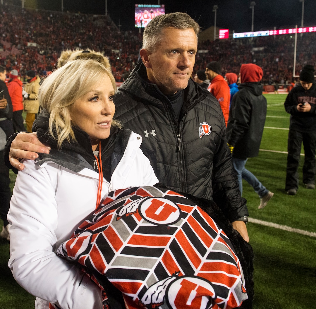 (Rick Egan  |  The Salt Lake Tribune)        Utah Utes head coach Kyle Whittingham leaves the field with his wife Jamie, after Utah defeated BYU for the 8th straight time, in football action between the Brigham Young Cougars and the Utah Utes, at Rice-Eccles Stadium, Saturday, November 24, 2018.