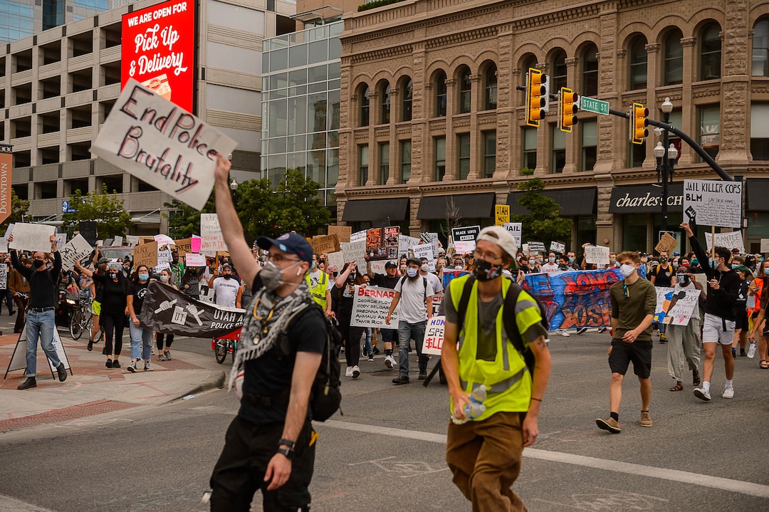 (Trent Nelson  |  The Salt Lake Tribune) People march against police brutality in Salt Lake City on Saturday, June 13, 2020.