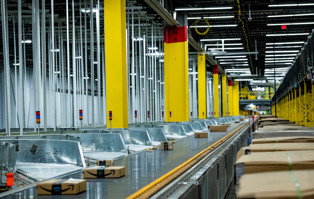 (Isaac Hale | Special to The Tribune) Completed packages make their way along a high-speed conveyor belt toward their final destination in the facility during a tour of the Amazon fulfillment center in Salt Lake City on Thursday, June 10, 2021. Amazon announced Tuesday, Oct. 26, 2021, that it was opening another fulfillment center in Salt Lake City for same-day orders.