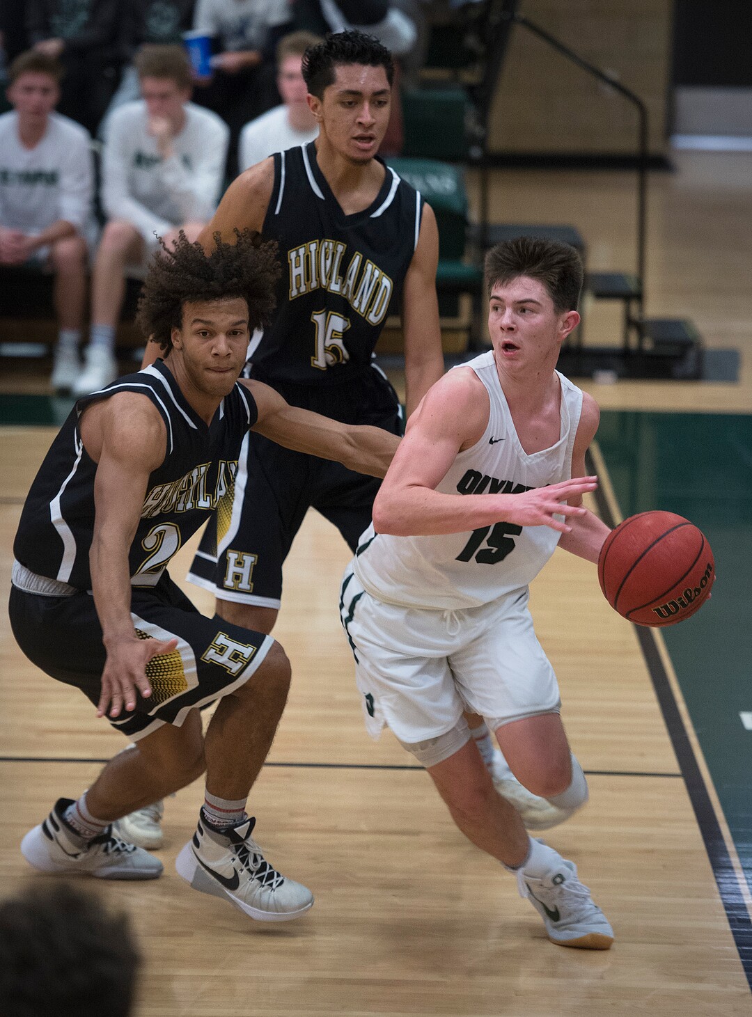 (Scott Sommerdorf   |  The Salt Lake Tribune)   Rylan Jones drives the baseline during second half play as Olympus defeated Highland 70-49, Friday, January 19, 2018.