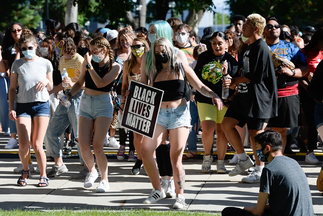 (Francisco Kjolseth  |  The Salt Lake Tribune) Revelers dance during the Juneteenth celebration at Washington Square in Salt Lake City on Friday, June 19, 2020.