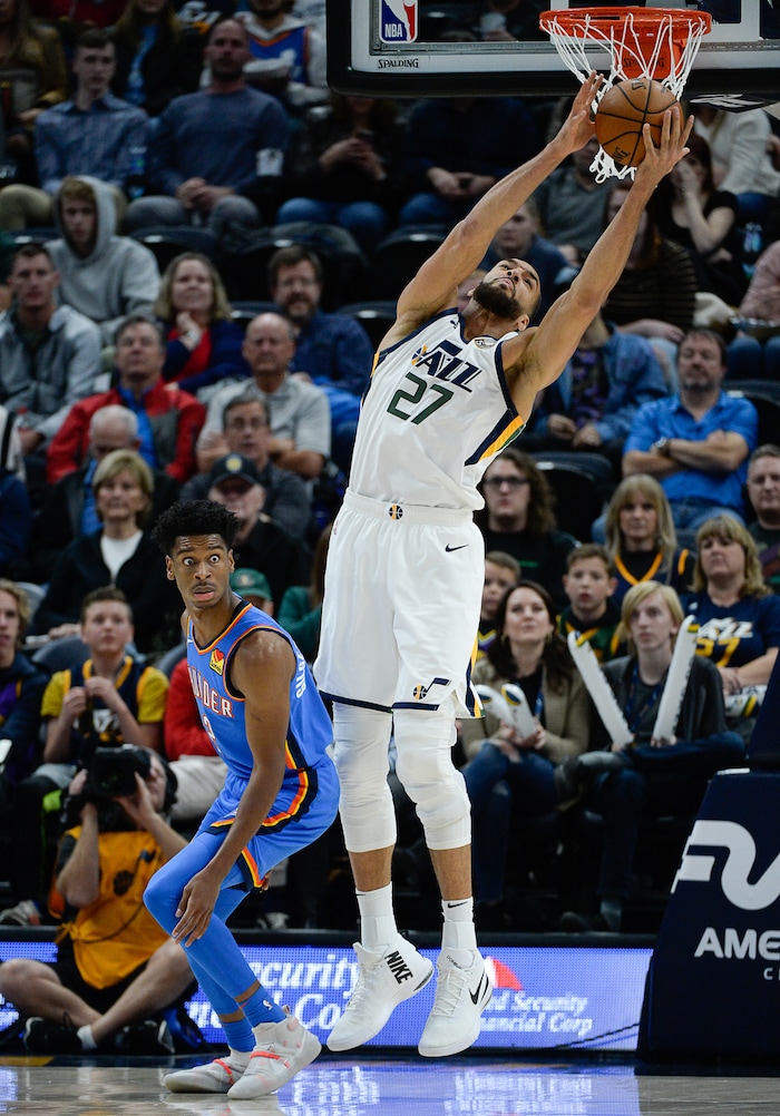 (Francisco Kjolseth  |  The Salt Lake Tribune)  Utah Jazz center Rudy Gobert (27) stretches out for a rebound as the Utah Jazz host the Oklahoma City Thunder in their NBA basketball game at Vivint Smart Home Arena in Salt Lake City on Mon. Dec. 9, 2019.