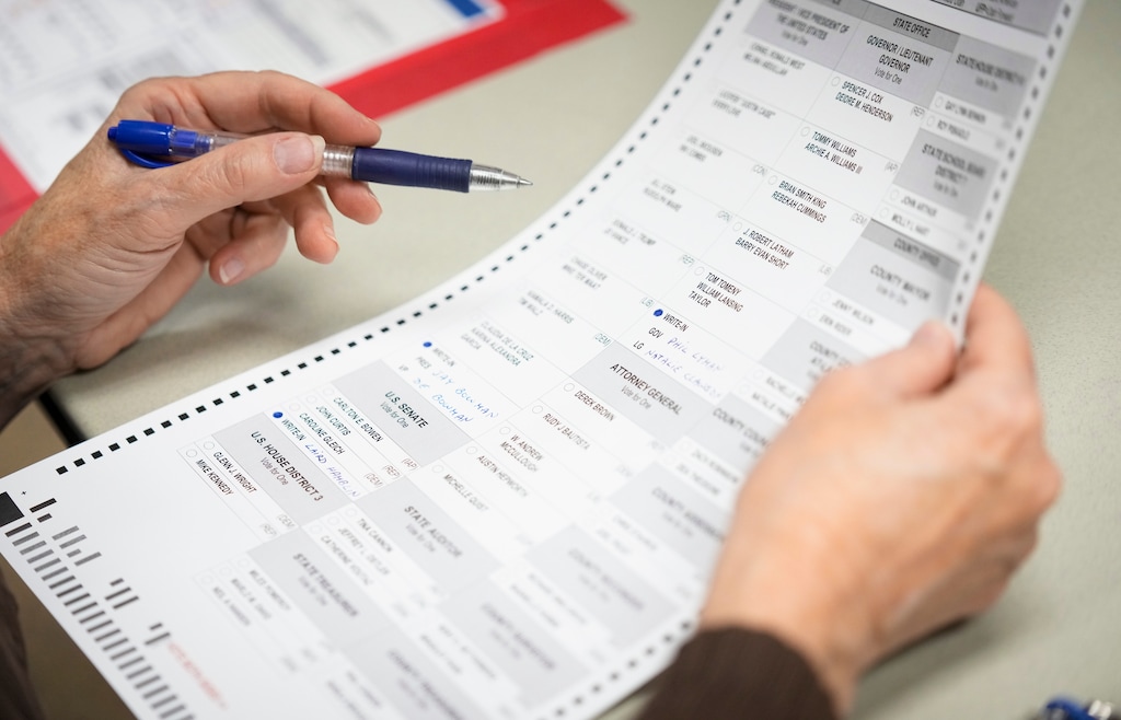 (Bethany Baker | The Salt Lake Tribune) An observer fills out a test ballot during a Òlogic and accuracyÓ test, as required by the state before every major election, at Salt Lake County Government Center in Salt Lake City on Friday, Oct. 11, 2024.