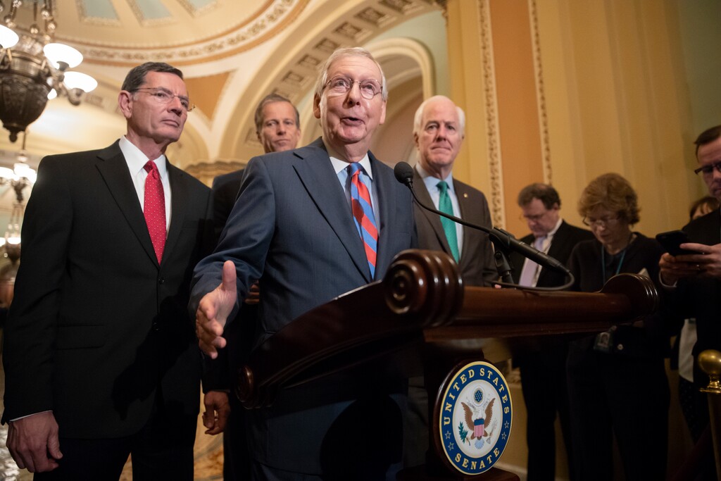 Senate Majority Leader Mitch McConnell, R-Ky., joined by, from left, Sen. John Barrasso, R-Wyo., Sen. John Thune, R-S.D., and Majority Whip John Cornyn, R-Texas, speaks to reporters following a closed-door luncheon with President Donald Trump, at the Capitol in Washington, Tuesday, May 15, 2018. (AP Photo/J. Scott Applewhite)