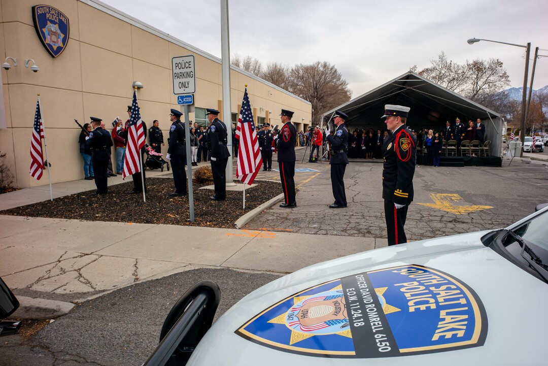 (Trent Nelson  |  The Salt Lake Tribune) The South Salt Lake Police & Fire Honor Guard perform a Flag Raising Ceremony at the dedication of the David P. Romrell Public Safety Building on Sunday Nov. 24, 2019. The building is named after Officer Romrell, who was killed in the line of duty on Nov. 24, 2018 - one year ago.
