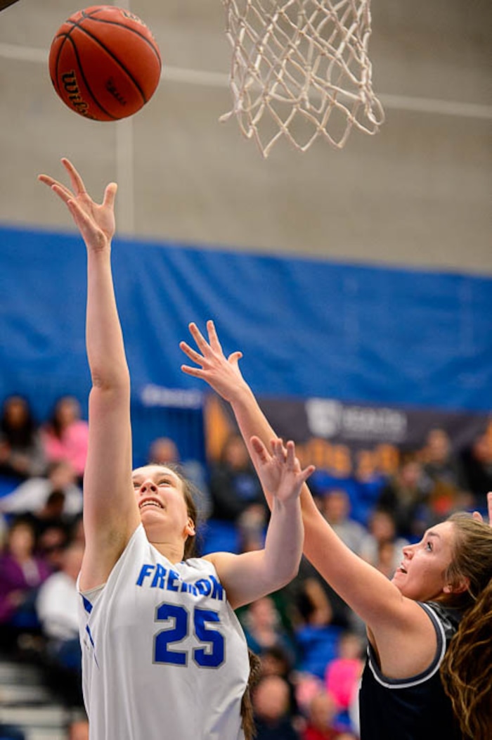 (Trent Nelson | The Salt Lake Tribune)  Fremont's Emma Calvert (25) shoots as Hunter faces Fremont in the 6A High School Girls' Basketball Tournament at SLCC in Taylorsville, Tuesday Feb. 20, 2018.