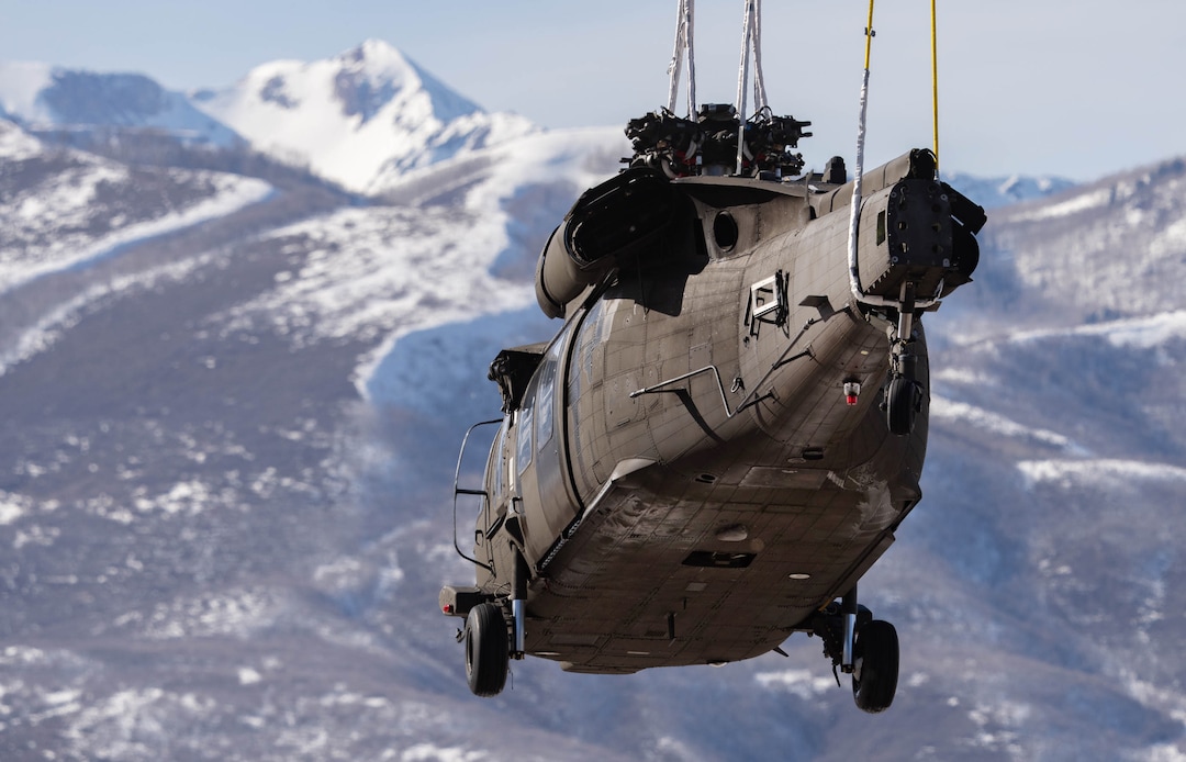 (Francisco Kjolseth | The Salt Lake Tribune) Recovery operations for two Utah Army National Guard UH-60 Black Hawk helicopters involved in a training accident in the Mineral Basin area last week are performed by a CH-47 Chinook helicopter and brought to the Heber Valley Airport on Wednesday, March 2, 2022.