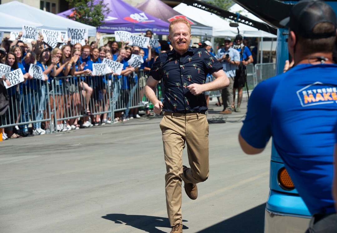(Rick Egan | The Salt Lake Tribune) Jesse Tyler Ferguson gets the crowd going while filming an episode of the TV show "Extreme Makeover: Home Edition" in Ogden, Thursday, Aug. 15, 2019.