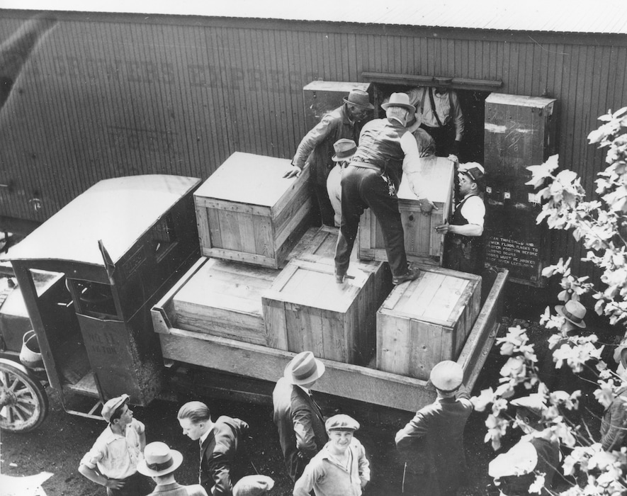 FILE - In this May 15, 1929, file photo authorities unload cases of whiskey crates labeled as green tomatoes from a refrigerator car in the Washington yards. The grower's express cargo train was en route from Holandale, Fla., to Newark, N.J. Statistically, Prohibition was not an utter failure. Deaths from alcohol-related cirrhosis declined, as did arrests for public drunkenness. What the statistics don't measure is how extensively Prohibition was flouted. Bootleggers established vast distribution networks. (AP Photo, File)