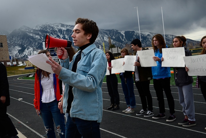 Scott Sommerdorf | The Salt Lake Tribune
Student organizer Isaac Reese addresses the crowd of students who walked out of class at Brighton High and gathered in the football stadium. The students read aloud the names of each of the 17 students and staff killed at Marjory Stoneman Douglas High School, during their walkout at Brighton High School, Wednesday, March 14, 2018.
