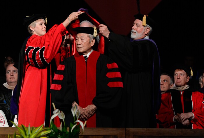 (Francisco Kjolseth  |  The Salt Lake Tribune)  Raymond Sonji Uno, who spent his young life in a Japanese internment camp and went on to earn a law degree and become a judge in the Salt Lake City court is given an honorary degree during University of Utah's commencement ceremonies on Thursday, May 3, 2018, at the Jon M. Huntsman Center.