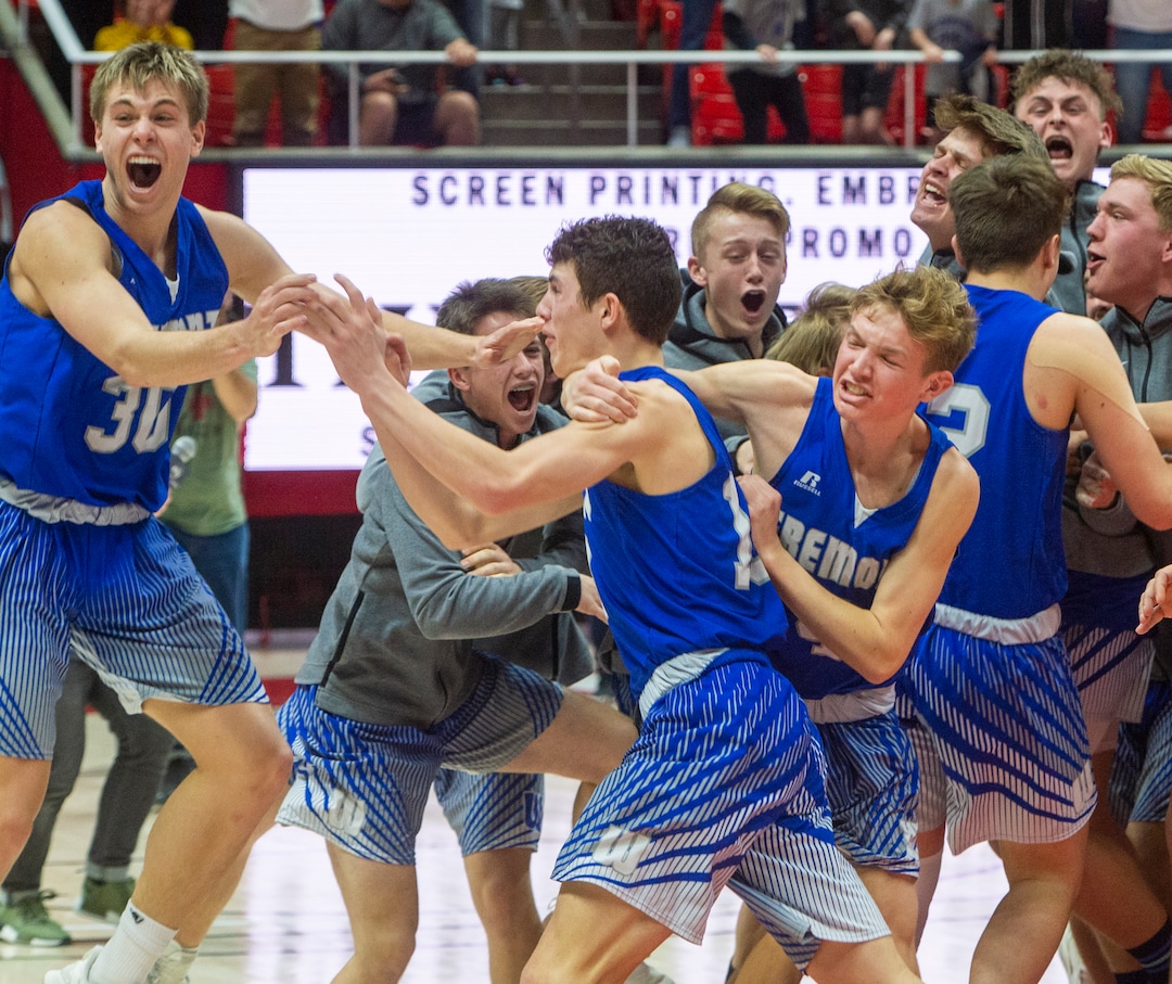(Rick Egan  |  The Salt Lake Tribune)    The Fremont Silverwolves celebrate their 55-52 win over the Davis Darts, in the 6A basketball championship game at the Jon M. Huntsman Center, Saturday Feb. 29, 2020