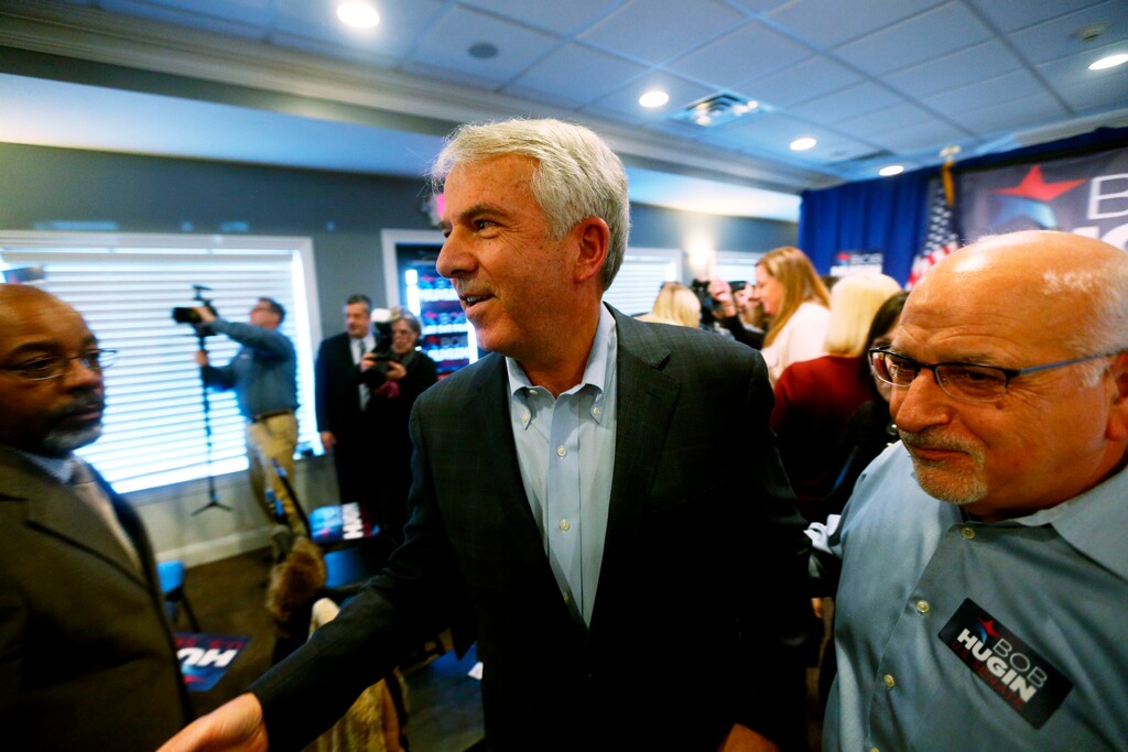 In a Feb. 13, 2018 photo, Bob Hugin greets the public after announcing he's running for U.S. Senate as a Republican, challenging U.S. Robert Menendez, at the Springfield Elks Lodge in Springfield , NJ. Incumbent Democratic Sen. Bob Menendez and Republican challenger Bob Hugin are hurling insults at one another in what will be New Jersey's only statewide contest this fall and an arena in the national fight for control of the narrowly divided Senate.b b (Ed Murray/The Star-Ledger via AP)