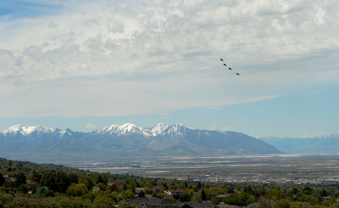 (Leah Hogsten  |  The Salt Lake Tribune) Onlookers lined Bountiful Blvd. to get a glimpse of the F-35Õs passing through Davis County.  In support of the healthcare workers, first responders and essential personnel on the front lines of the fight against COVID-19, Hill Air Force BaseÕs F-35 pilots from the Demo Team and the 388th Fighter Wing flew over the state, April 30, 2020.