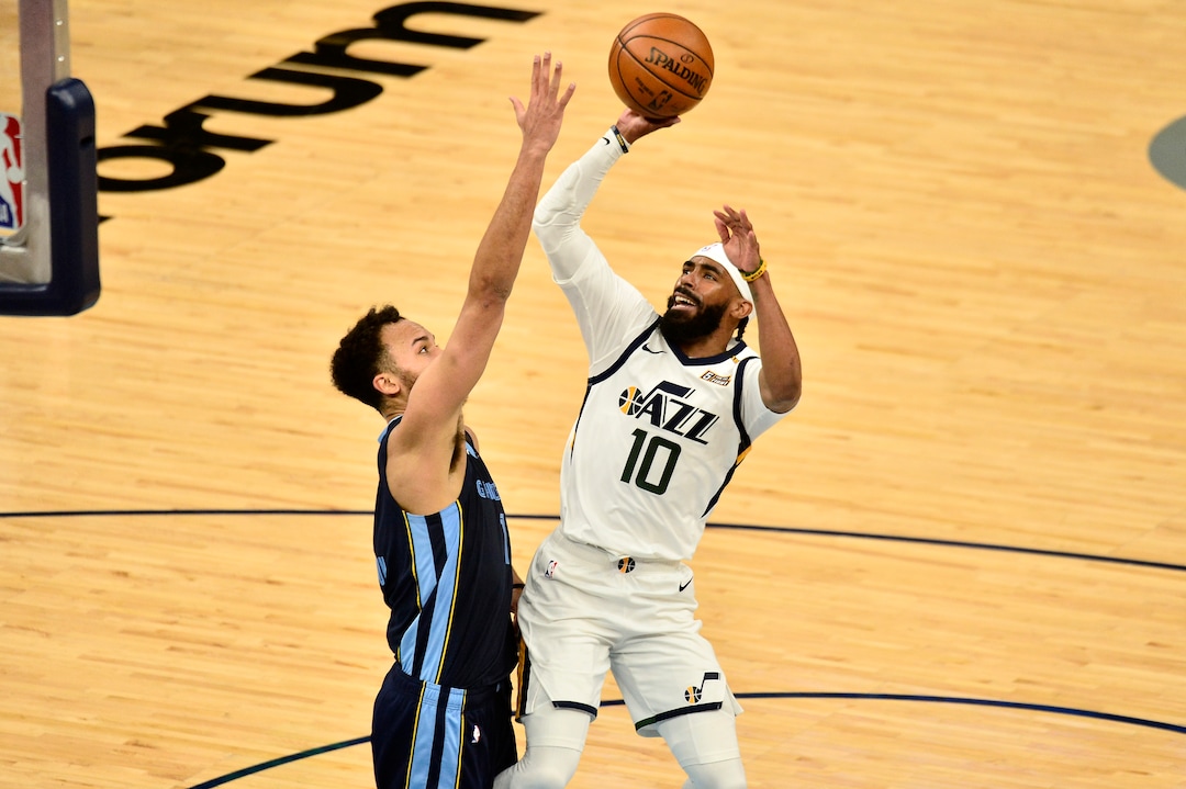 Utah Jazz guard Mike Conley (10) shoots against Memphis Grizzlies forward Kyle Anderson (1) in the second half of Game 4 of an NBA basketball first-round playoff series Monday, May 31, 2021, in Memphis, Tenn. (AP Photo/Brandon Dill)