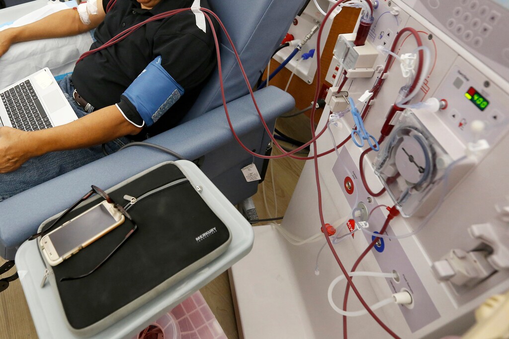 FILE - In this Monday, Sept. 24, 2018, file photo, a patient undergoes dialysis at a clinic in Sacramento, Calif. (AP Photo/Rich Pedroncelli, File)