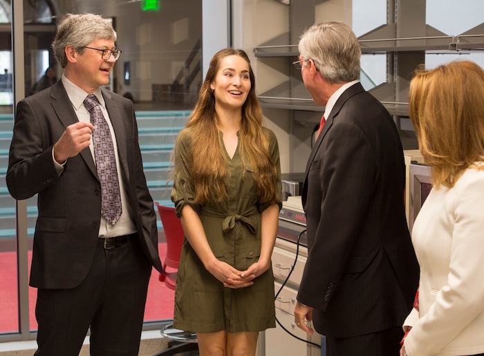(Rick Egan  |  The Salt Lake Tribune)     Markus Babst, Interim director of Eyring Center for Cell and Genome Science And Professor of Biology gives a tour of one of the new labs to Zoe Praggastif, graduate student, and Gary and Ann Crocker, at the opening of the new Gary and Ann Crocker Science Center on Presidents Circle, Thursday, April 19, 2018.


