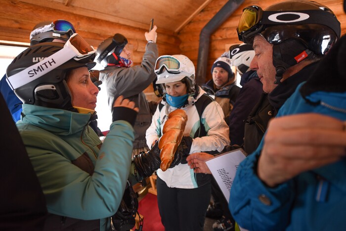(Francisco Kjolseth | The Salt Lake Tribune) A loaf of braided Challah bread is shared amongst worshippers after a Jewish Sabbath service at the small Sunset Cabin on the upper slopes of Deer Valley Resort on a recent Friday afternoon.