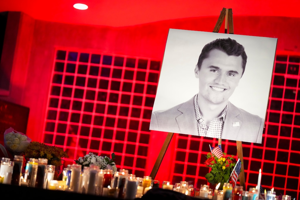 (Bethany Baker  |  The Salt Lake Tribune) A portrait of conservative activist Charlie Kirk is seen at a vigil in Orem on Thursday, Sept. 11, 2025.