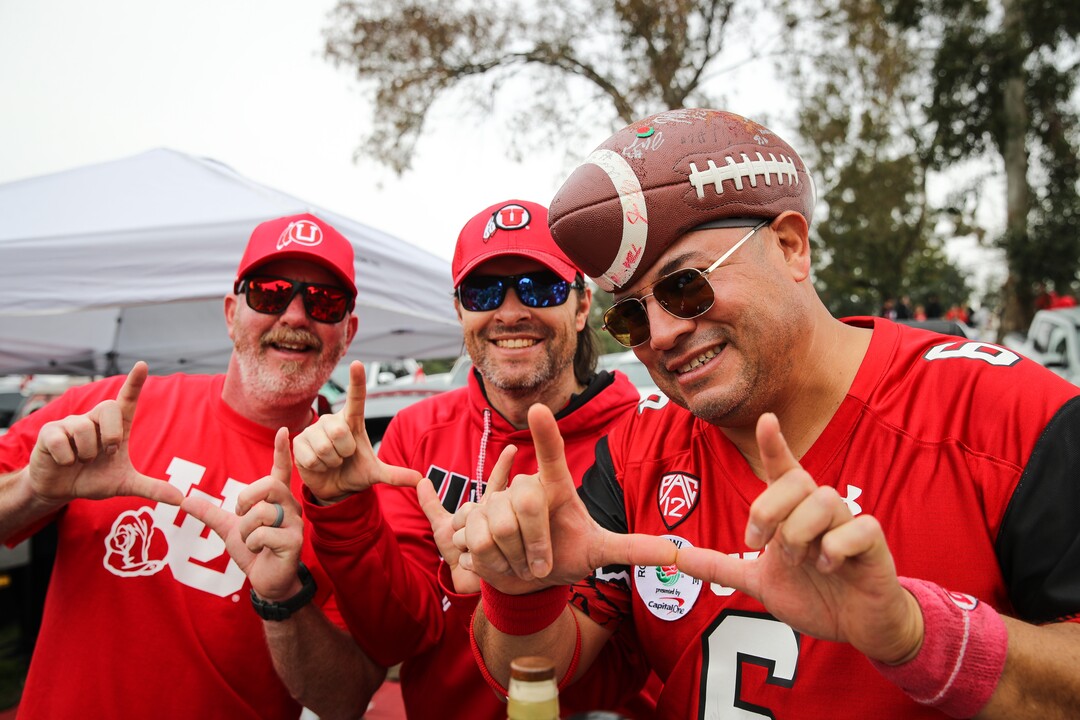 (Meg Oliphant | Special to The Tribune) Utah fans Alex Whitt, Jared Phifer, and Albert Gamboa pose for a photo at their tailgate ahead of the game between the Penn State Nittany Lions and the Utah Utes at Rose Bowl Stadium on Jan. 2, 2023 in Pasadena, Calif.