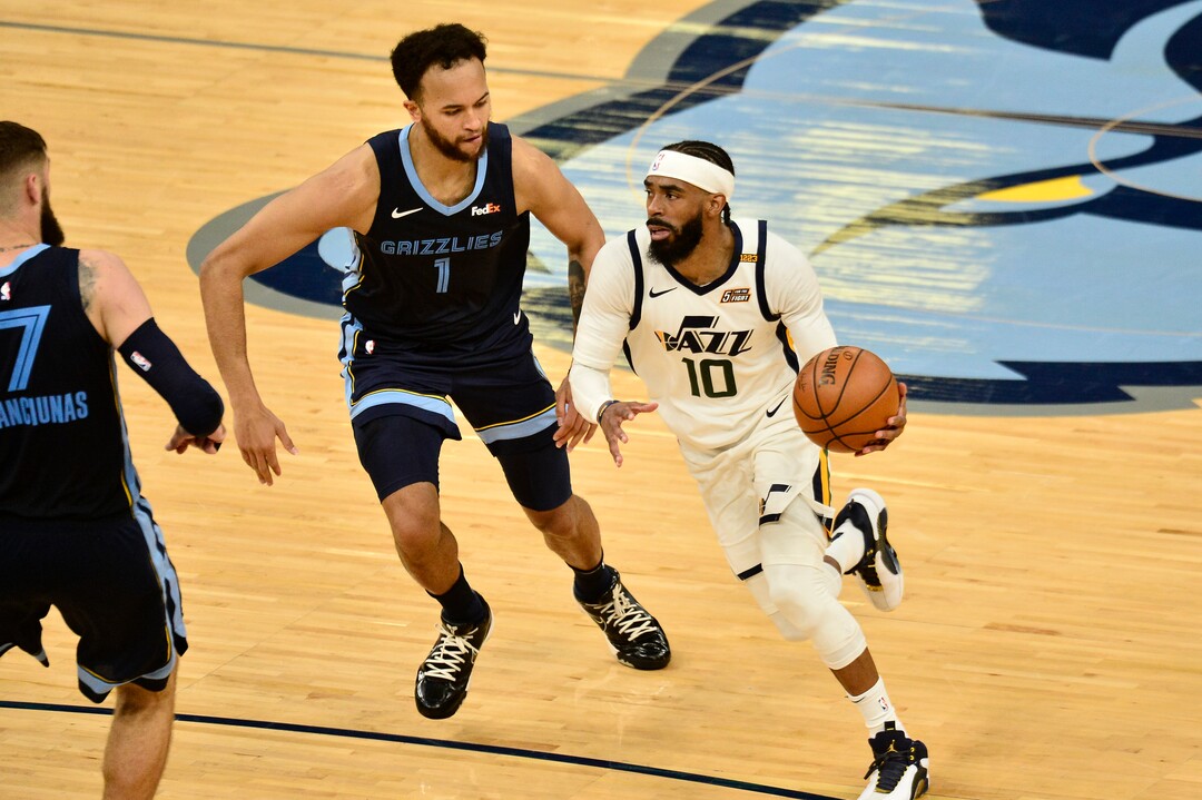 Utah Jazz guard Mike Conley (10) handles the ball ahead of Memphis Grizzlies forward Kyle Anderson (1) in the second half of Game 4 of an NBA basketball first-round playoff series Monday, May 31, 2021, in Memphis, Tenn. (AP Photo/Brandon Dill)
