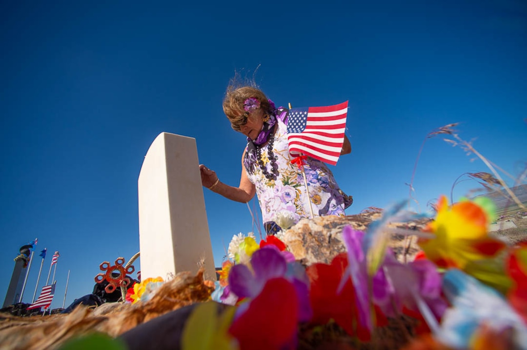 (Trent Nelson | The Salt Lake Tribune)  Descendants of the Hawaiians who settled the desert town of Iosepa took time during their Memorial Day gathering to clean the graves of their ancestors, Saturday May 26, 2018.   Deborah Hoopiiaina decorates the grave of her uncle, Conie Hoopiiaina.