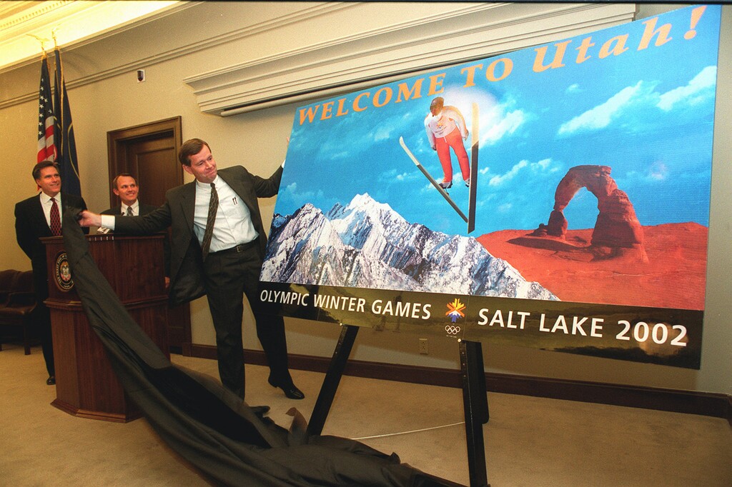 (Paul Fraughton | The Salt Lake Tribune) Then-Gpv. Mike Leavitt unveils the new Welcome to Utah signs that will greet motorists on the major interstates and highways along the state borders ahead of the 2002 Olympic and Paralympic Games. Leavitt said at an Envision Utah breakfast Wednesday, May 28, 2025, that  the quality of life in Utah would not have been as good without the Games, despite — or because of — the state's growth.