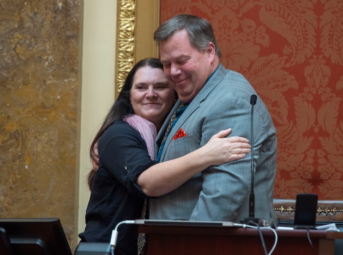 (Rick Egan  |  The Salt Lake Tribune)   Acting speaker Rep. Eric Hutchings breaks House protocol as he interrupts last-day business on the floor to announce that he and his wife Stacey are celebrating their 22nd wedding anniversary today. Thursday, March 14, 2019. After chants from members of the house, he gave her a kiss on the Dais.