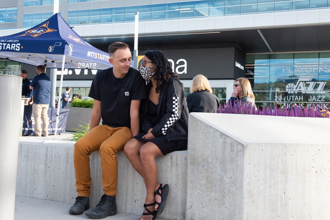 (Briana Scroggins | Special to The Tribune) Austin Armijo, of Salt Lake City, and Melissa Bouttavong, of Kearns, sit close outside of Vivint Smart Home Arena before the Jazz play the Memphis Grizzlies in Salt Lake City on Wednesday, May 26, 2021. The couple have been dating for two years and this is the second Jazz game they have been to this season.  The first game was on Valentines Day.