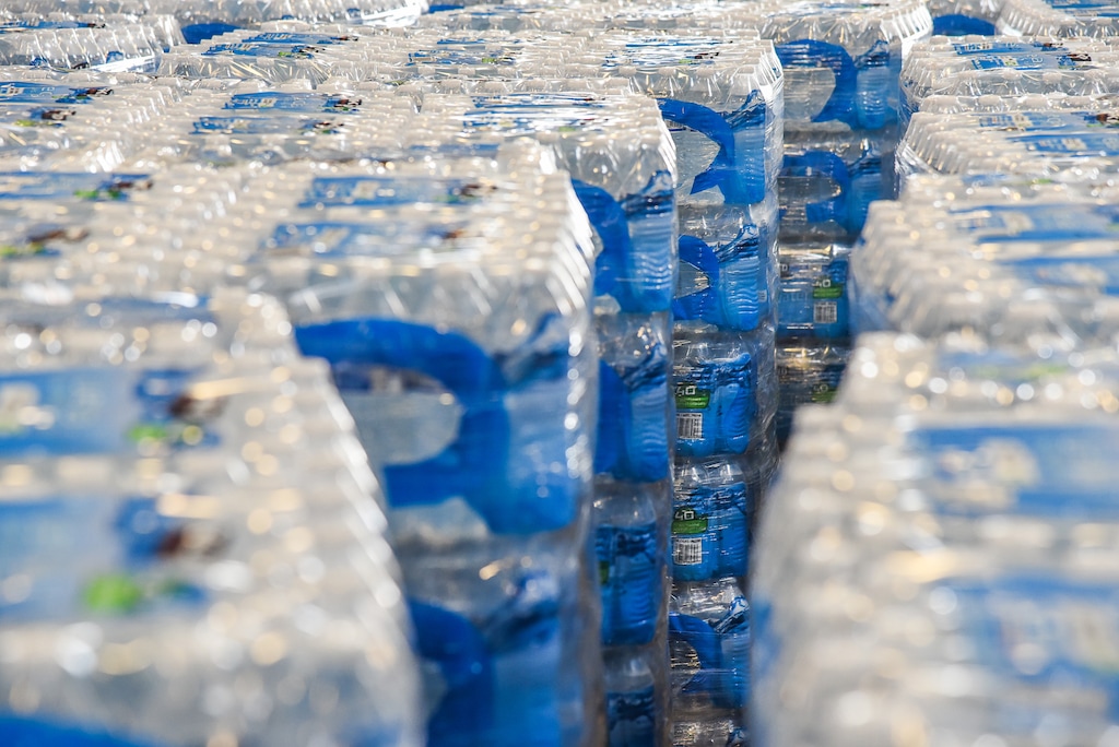 (Francisco Kjolseth | The Salt Lake Tribune) Cases of water are stored at the Sandy Operations Center at 9150 South, 150 East on Sunday, Feb. 17, 2019 for residents to pick up. The no drink order now applies only to homes and businesses between 1700 East and 2000 East and 10600 South and 11400 South, the city announced Sunday. The city says the problem started about Feb. 6, when a fluoride pump malfunctioned because of a power outage. It flooded the water system with fluoride and that also led to high levels of lead and copper, enough that it made some people sick.