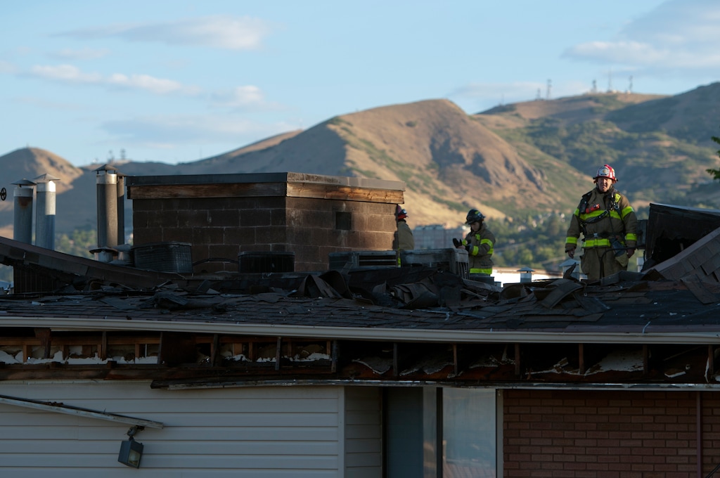 (Ed Kosmicki | Special to The Tribune) Firefighters inspect the aftermath of a fire at a condo complex in Salt Lake City on Monday, June 28, 2021.