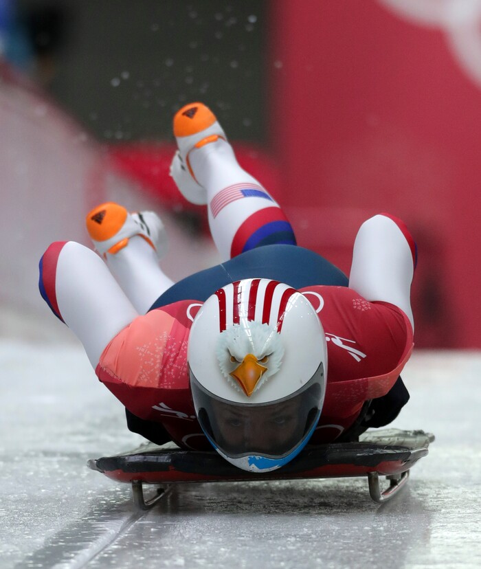 Katie Uhlaender of United States starts her first run during the women's skeleton competition at the 2018 Winter Olympics in Pyeongchang, South Korea, Friday, Feb. 16, 2018. (AP Photo/Michael Sohn)