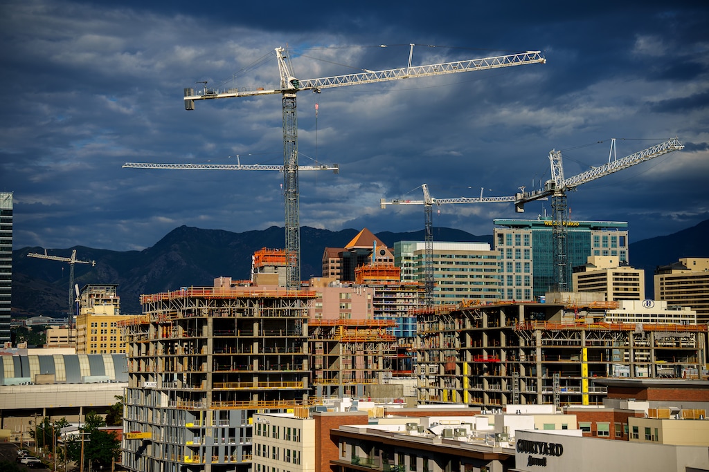 (Trent Nelson | The Salt Lake Tribune) Construction cranes dominate the Salt Lake City skyline on Thursday, June 24, 2021. Utah's capital is bigger than ever, with a population just shy of 200,000.