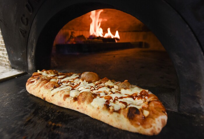 (Francisco Kjolseth | The Salt Lake Tribune) Focaccia Americana featuring BBQ sauce, onion, chicken breast and mozzarella from Terra Mia Italian restaurant in Draper, a sister restaurant to Terra Mia in Orem.