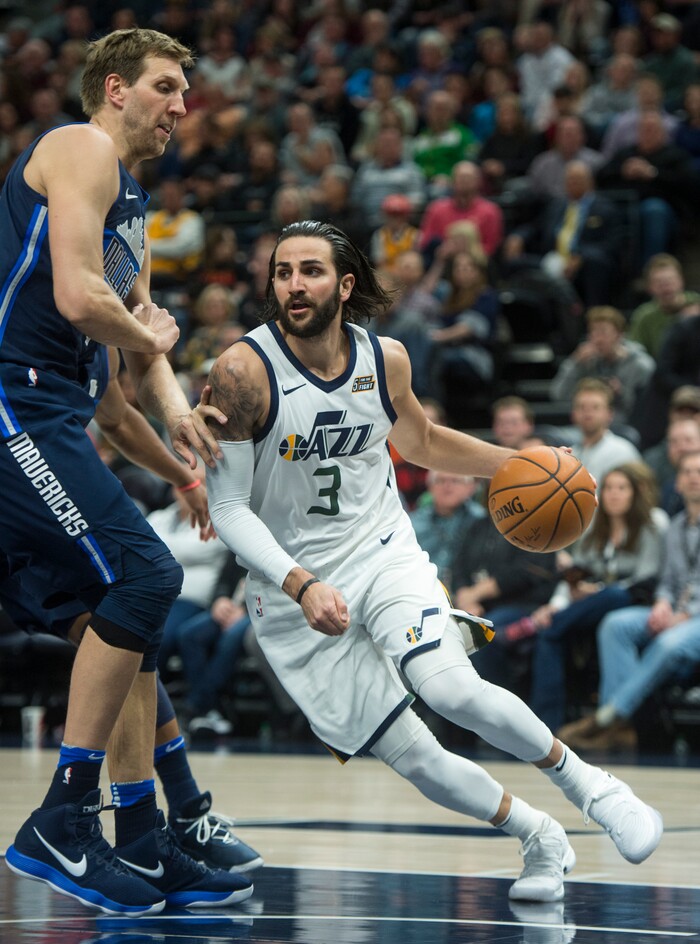 (Rick Egan  |  The Salt Lake Tribune)    Utah Jazz guard Ricky Rubio (3) gets past Dallas Mavericks forward Dirk Nowitzki (41), in NBA action between Utah Jazz and Dallas Mavericks in Salt Lake City, Saturday, Feb. 24, 2018.


