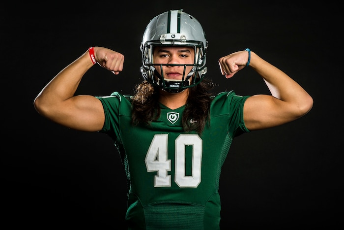 (Chris Detrick | The Salt Lake Tribune) Olympus tight end Cameron Latu poses for a portrait Wednesday, December 13, 2017.