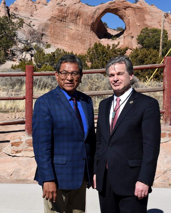 In this Friday, March 2, 2018, photo provided by the Federal Bureau of Investigations, shows Navajo Nation President Russell Begaye, left, with FBI Director Christopher Wray during a first visit to the tribal capital in Window Rock, Ariz.   Wray arrived in the tribal capital in Window Rock, Ariz., on Friday, March 2 and spoke with Navajo Nation President Russell Begaye and other tribal and federal law enforcement officials, including FBI agents from New Mexico. FBI spokesman Frank Fisher says Wray's visit to the Navajo Nation was the first by a director.  (FBI via AP)