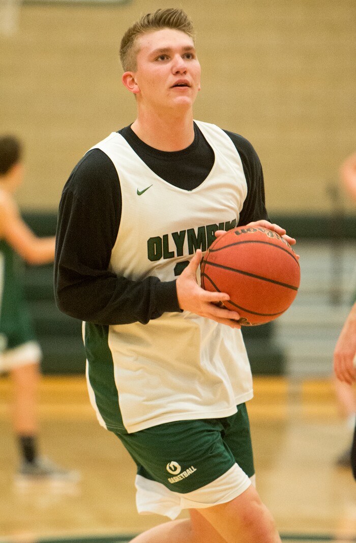 (Rick Egan  |  The Salt Lake Tribune)    Spencer Jones (22), one of Olympus boys' basketball team's two big men, runs drills during basketball practice, Monday, January 8, 2018.