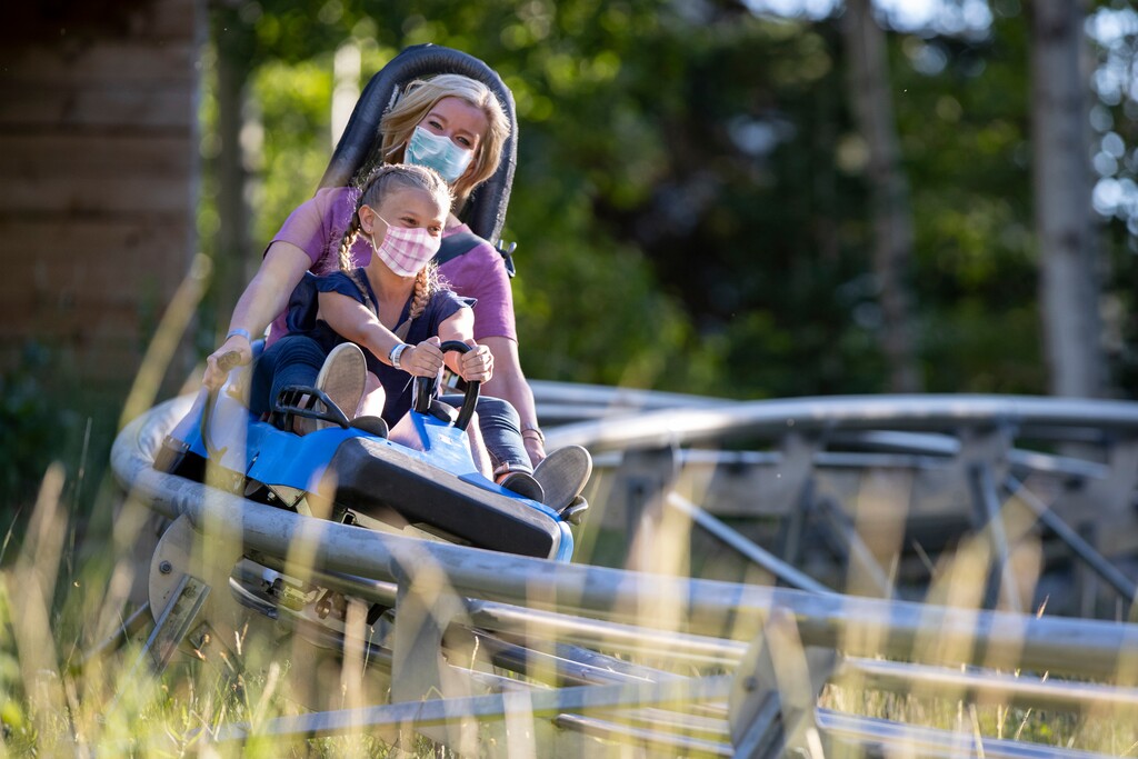 (Photo courtesy of Snowbird/Adam Barker Photography)  Snowbird opened its summer operations, including the alpine slide, June 13, 2020. It was one of the first Utah resorts to open since COVID-19 forced an abrupt end to the season in mid-March. To protect against the spread of the virus, all alpine slide sleds and the entire mountain coaster will be disinfected after each ride and employees are required to wear masks.