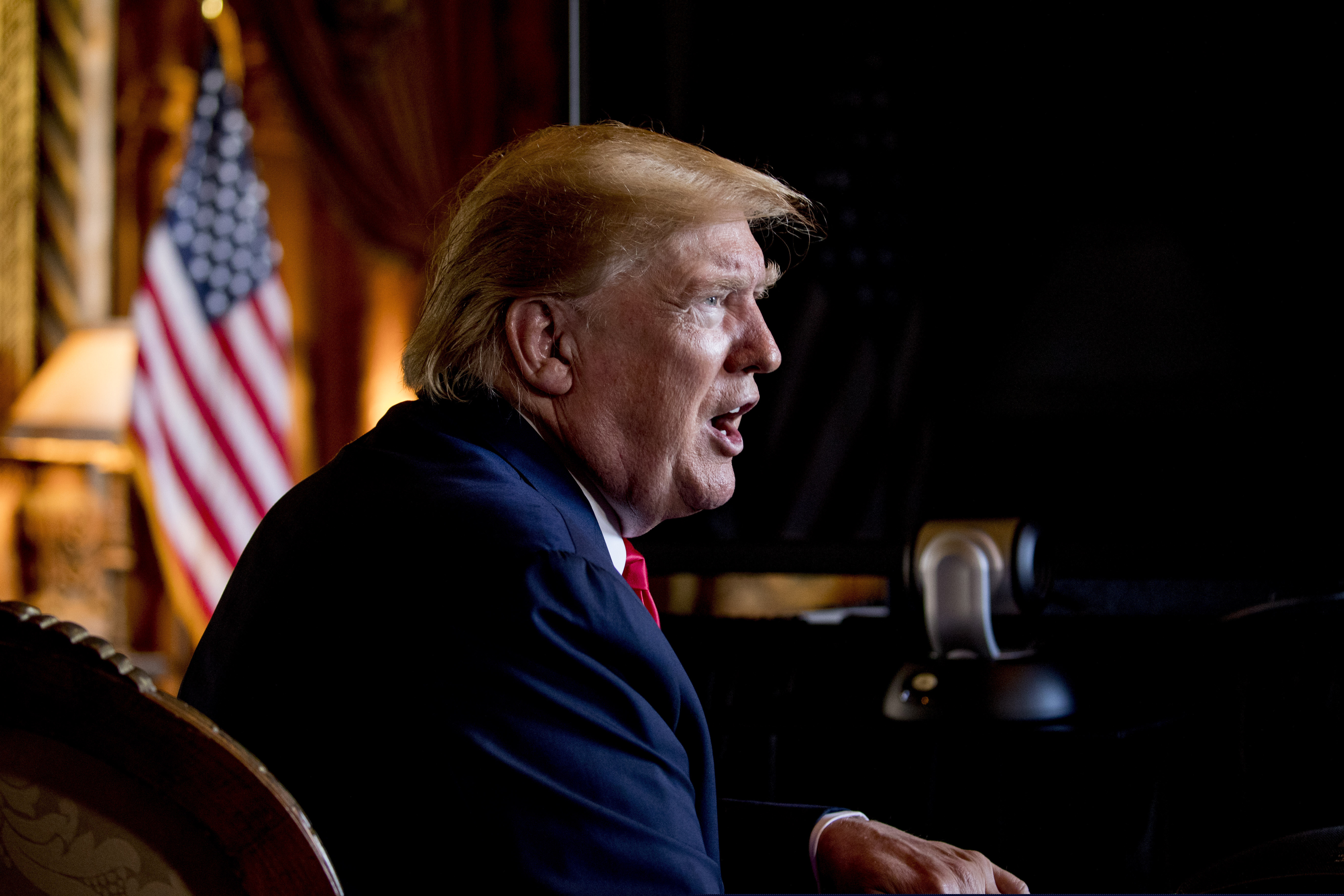 (Andrew Harnik | AP) In this Dec. 24, 2019 photo, President Donald Trump speaks to members of the media following a Christmas Eve video teleconference with members of the military at his Mar-a-Lago estate in Palm Beach, Fla. As a candidate for the White House, Donald Trump repeatedly promised that he would “immediately” replace President Barack Obama’s health care law with a plan of his own that would provide “insurance for everybody.” Back then, Trump made it sound that his plan — “much less expensive and much better” than the Affordable Care Act — was imminent. And he put drug companies on notice that their pricing power no longer would be “politically protected.” Nearly three years after taking office, Americans still are waiting for Trump’s big reveal.