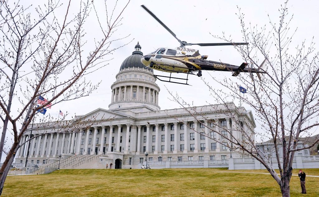 (Steve Griffin | Tribune file photo) A UHP helicopter floats in a for a landing on the Capitol lawn in Salt Lake City, Monday, March 10, 2014.